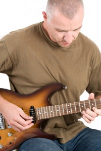 Man playing electrical guitar